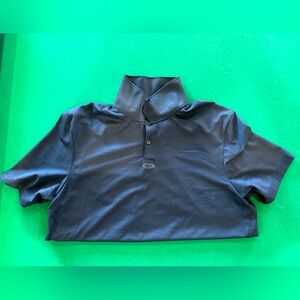Men’s Oakley navy colored polo size 2XL fits like an XL. In great condition